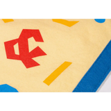 Red geometric shape with blue and yellow accents in Kelle Hampton inspired pendant light