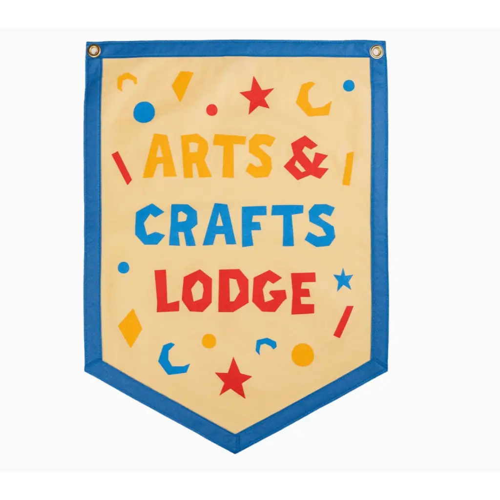 Shield-shaped banner with ARTS & CRAFTS LODGE by Kelle Hampton, featuring stars and moons