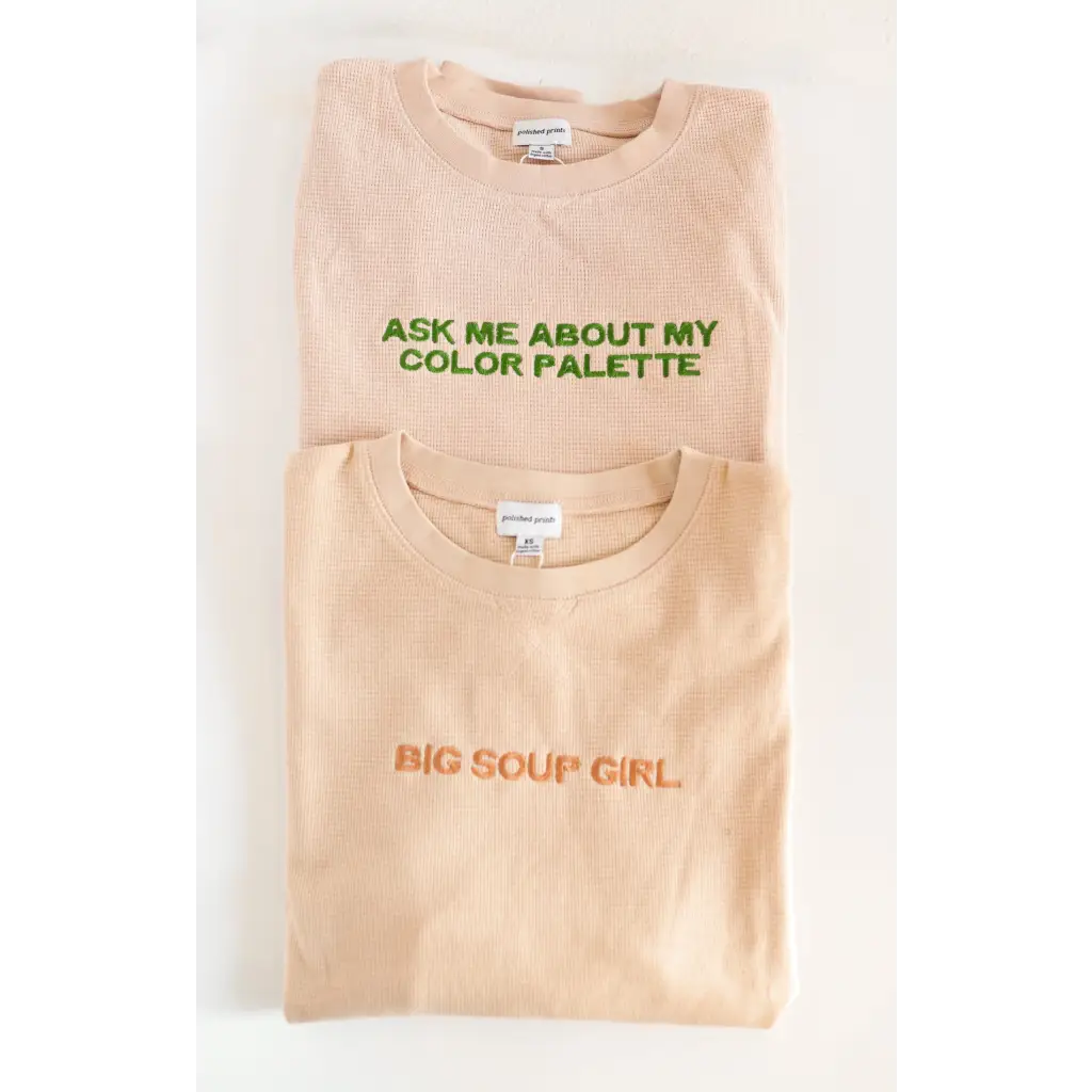 Two beige waffle pullovers with fun text about a color palette and being a big soup girl