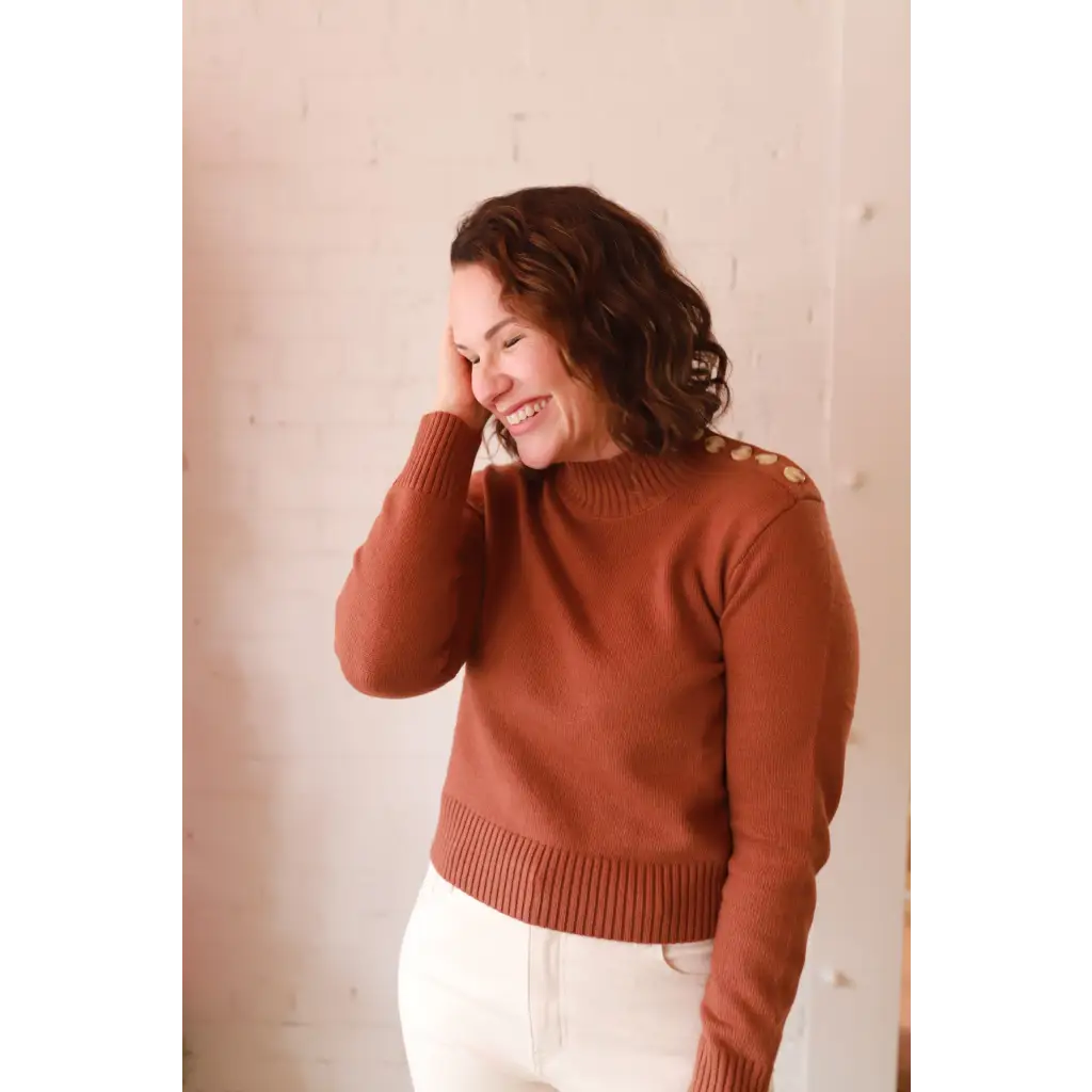 Stylish Ava Mock-Neck Sweater in rust ribbed knit with shoulder buttons