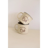 Two stacked speckled Campfire Mugs with Club text from Badass Babes 13oz set