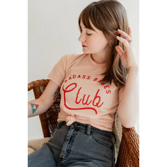 Peach Badass Babes Club Graphic Tee with bold red lettering for fierce style