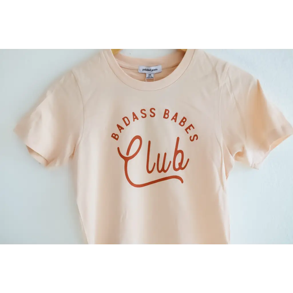 Peach t-shirt featuring badass babes club in orange, from the Limited Edition Sunkiss collection