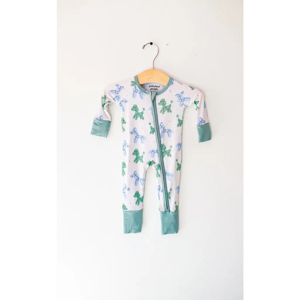 Cute Baby onesie with a fun balloon doggies bamboo pattern, perfect for cozy nights