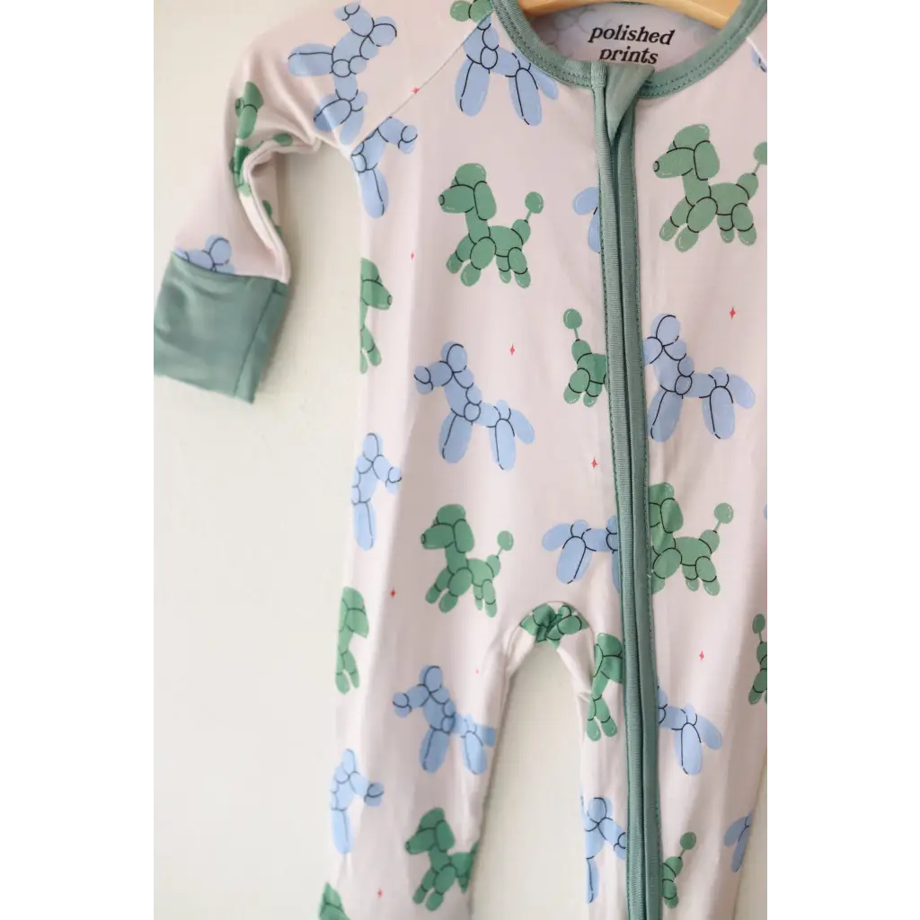 Baby pajamas featuring a fun Balloon Doggies Bamboo pattern in a cozy sleeper design