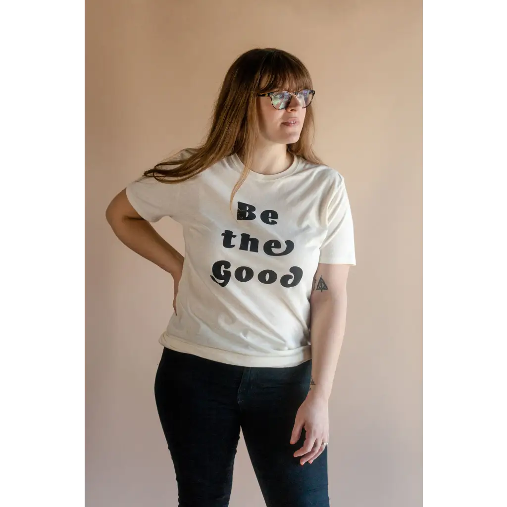 White Be the Good Adult Unisex Crew Neck T-shirt with black text design