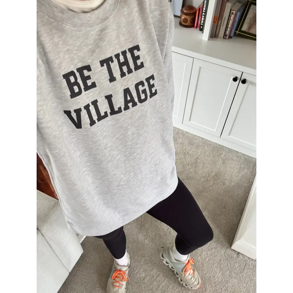 Gray Be the Village adult unisex pullover t-shirt with bold print