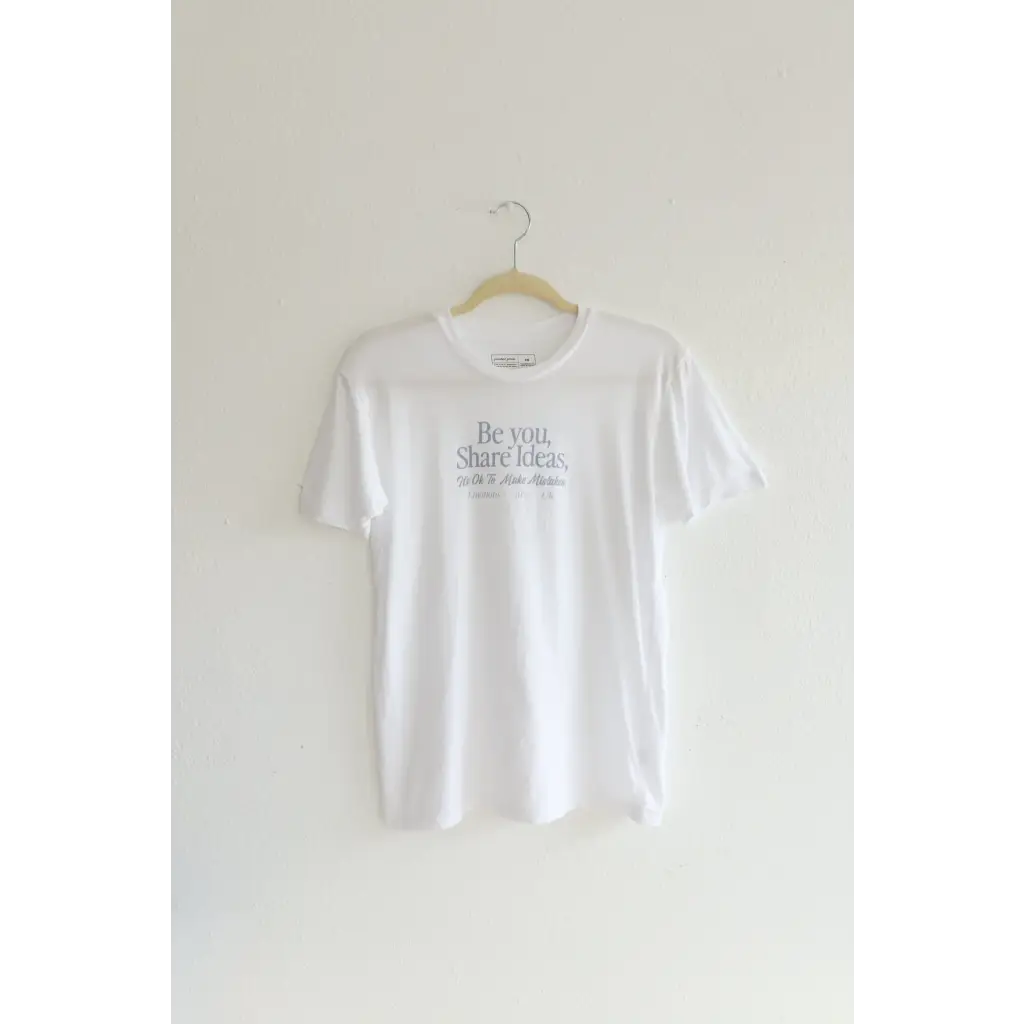 White Share Ideas Unisex Tee hanging on a hanger for everyday inspiration