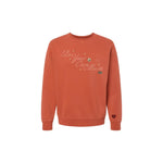 Rust-colored Independent Trading Company pullover with embroidered text and heart