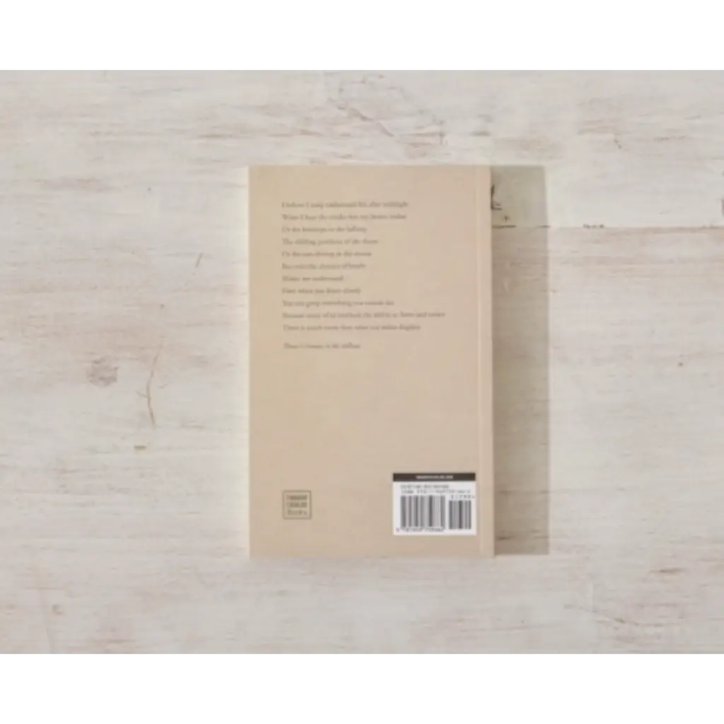 Cream-colored cover book Beauty in the Stillness with a barcode perfect for stylish moms