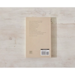 Cream-colored cover book Beauty in the Stillness with a barcode perfect for stylish moms