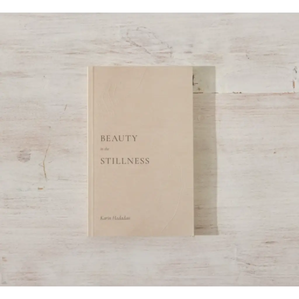 Beauty in Stillness book with a minimalist beige cover, perfect for moms who love polished prints