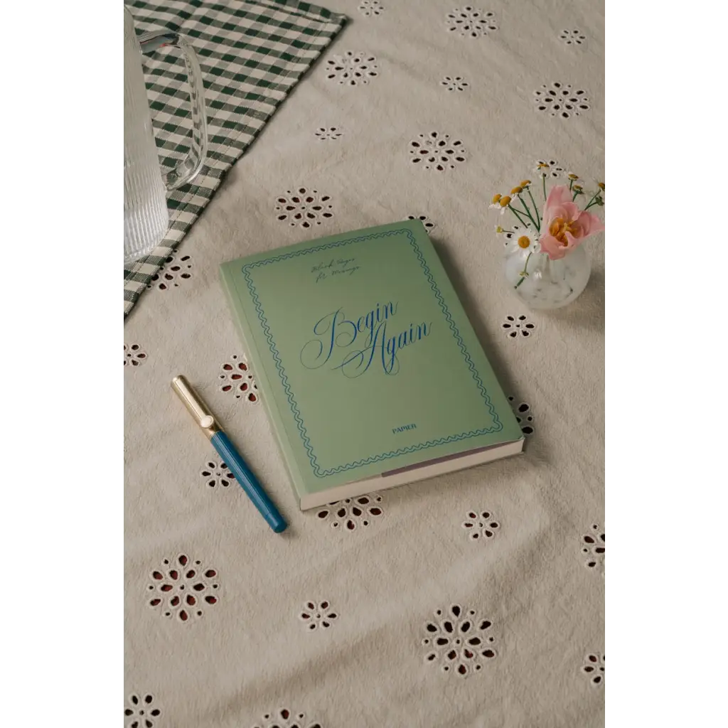 Green Begin Again journal with polished prints in stylish womens clothes for moms