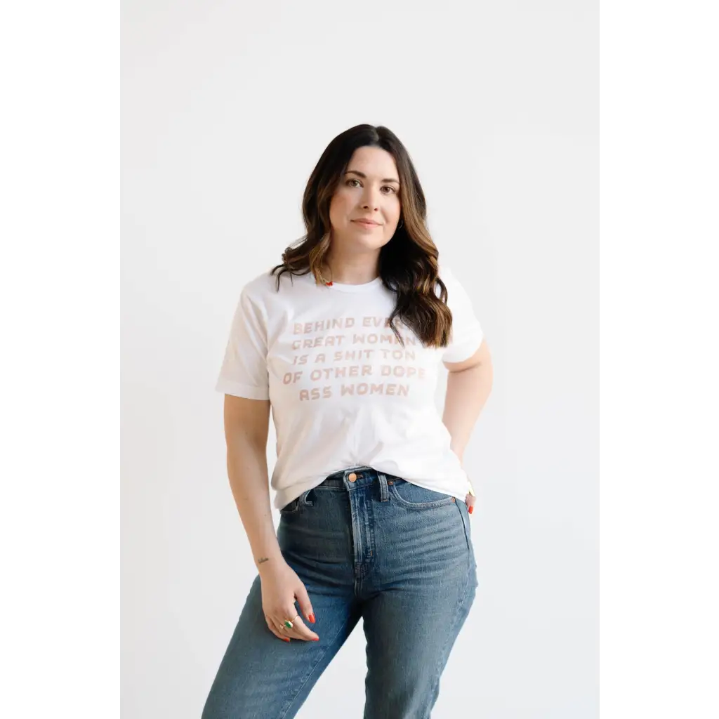 White unisex graphic tee celebrating dope ass women paired with blue jeans