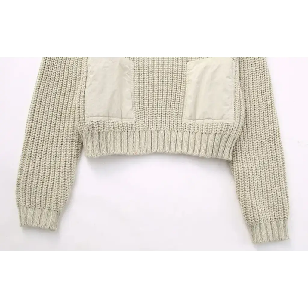 Cropped beige knit Bella Cropped Sweater with ribbed texture and pockets