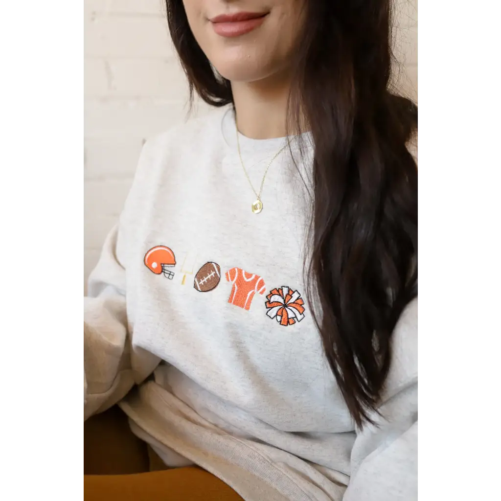 Light grey Big Fan Football embroidered sweatshirt with football-themed icons for fans