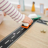 Black Play Road Tape with white stripes creates a fun play road surface for kids