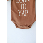 Brown organic cotton baby bodysuit from Born to Yap, super comfy for your little one