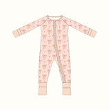 Pink and white striped bamboo baby sleeper with peach bow patterns