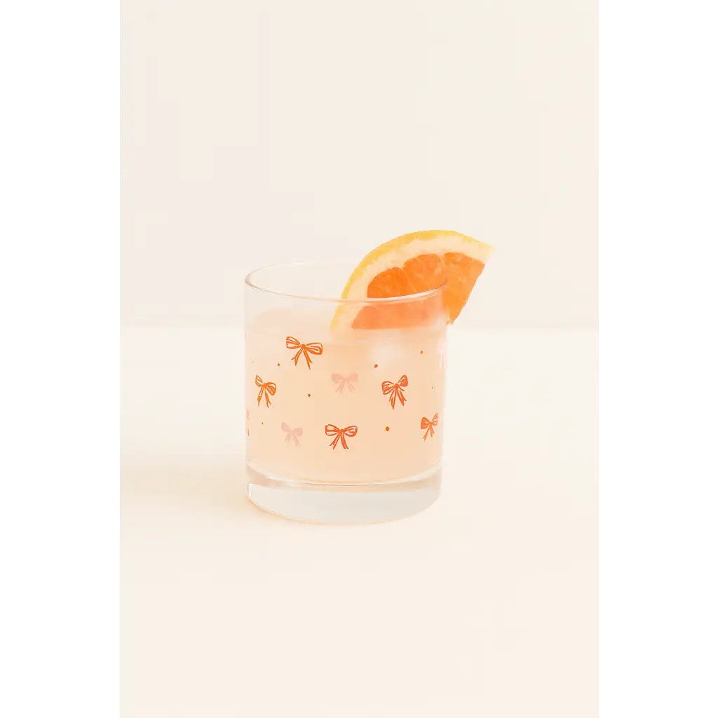 Bow Cocktail Glass Set with pink drink, grapefruit slice, perfect for peace signs camp vibes