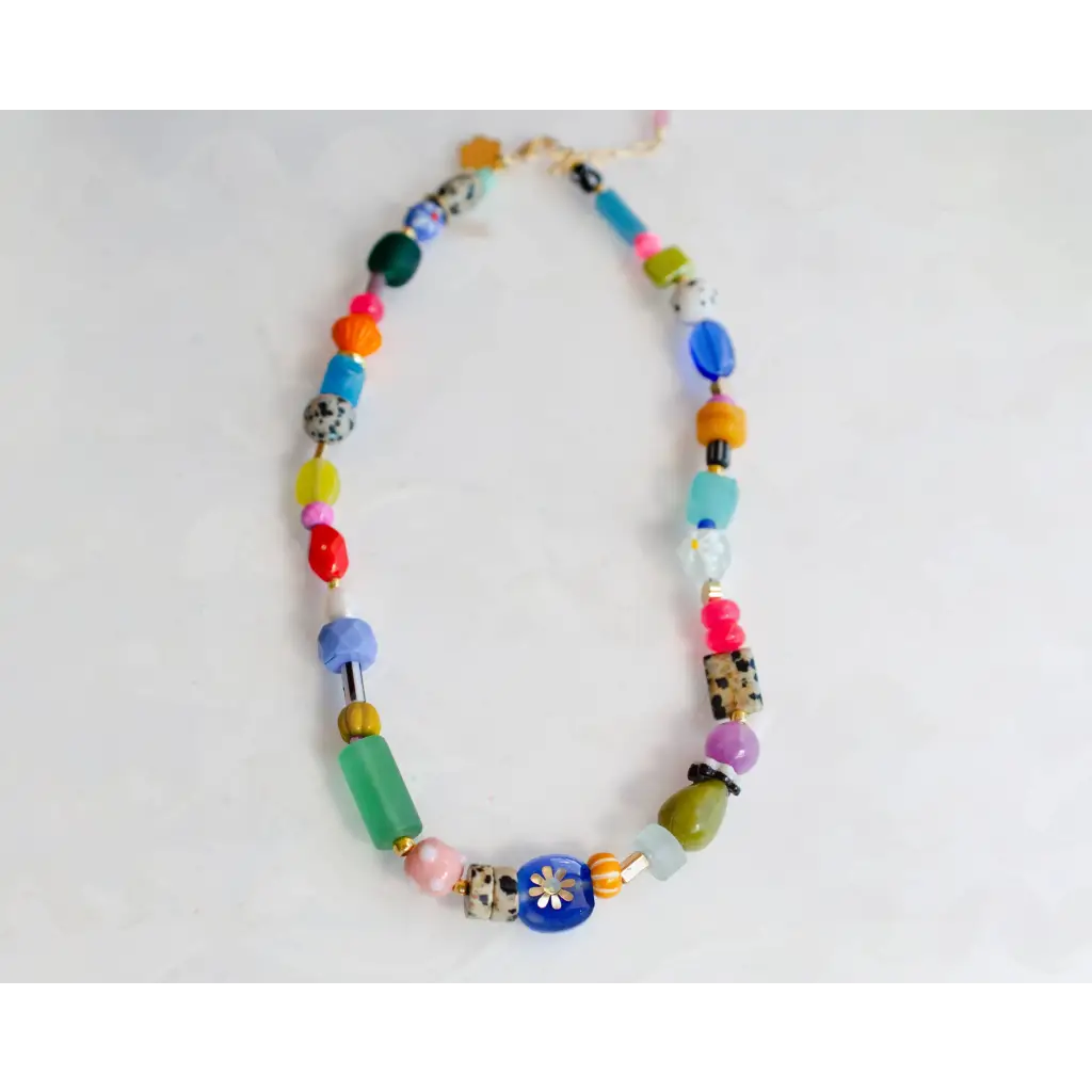 Bright colorful beaded necklace in vibrant blues greens pinks oranges purples