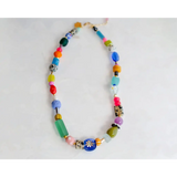 Bright colorful beaded necklace in vibrant blues greens pinks oranges purples