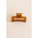 Brown medium size hair clip with rectangular design, your favorite go-to hair accessory