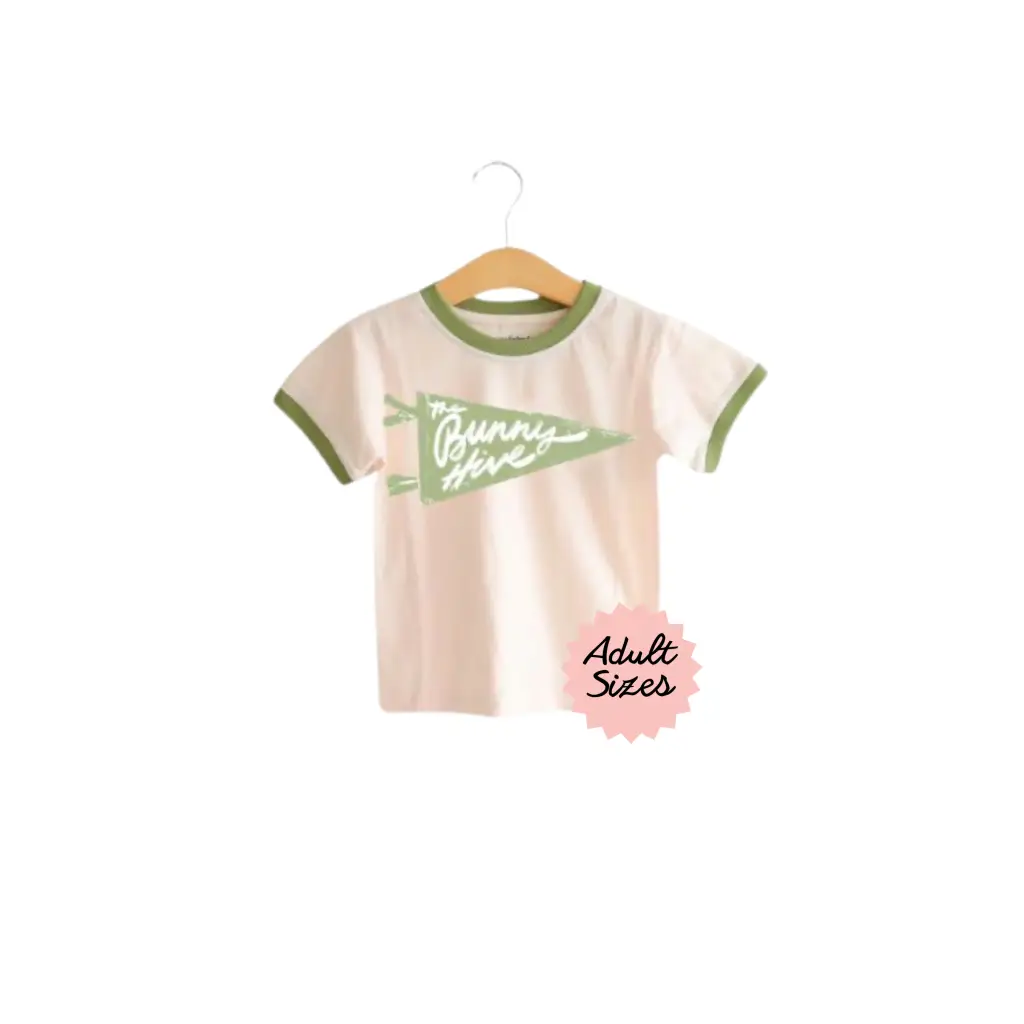 Cream-colored Bunny Hive Signature Ringer Tee with green trim for adults