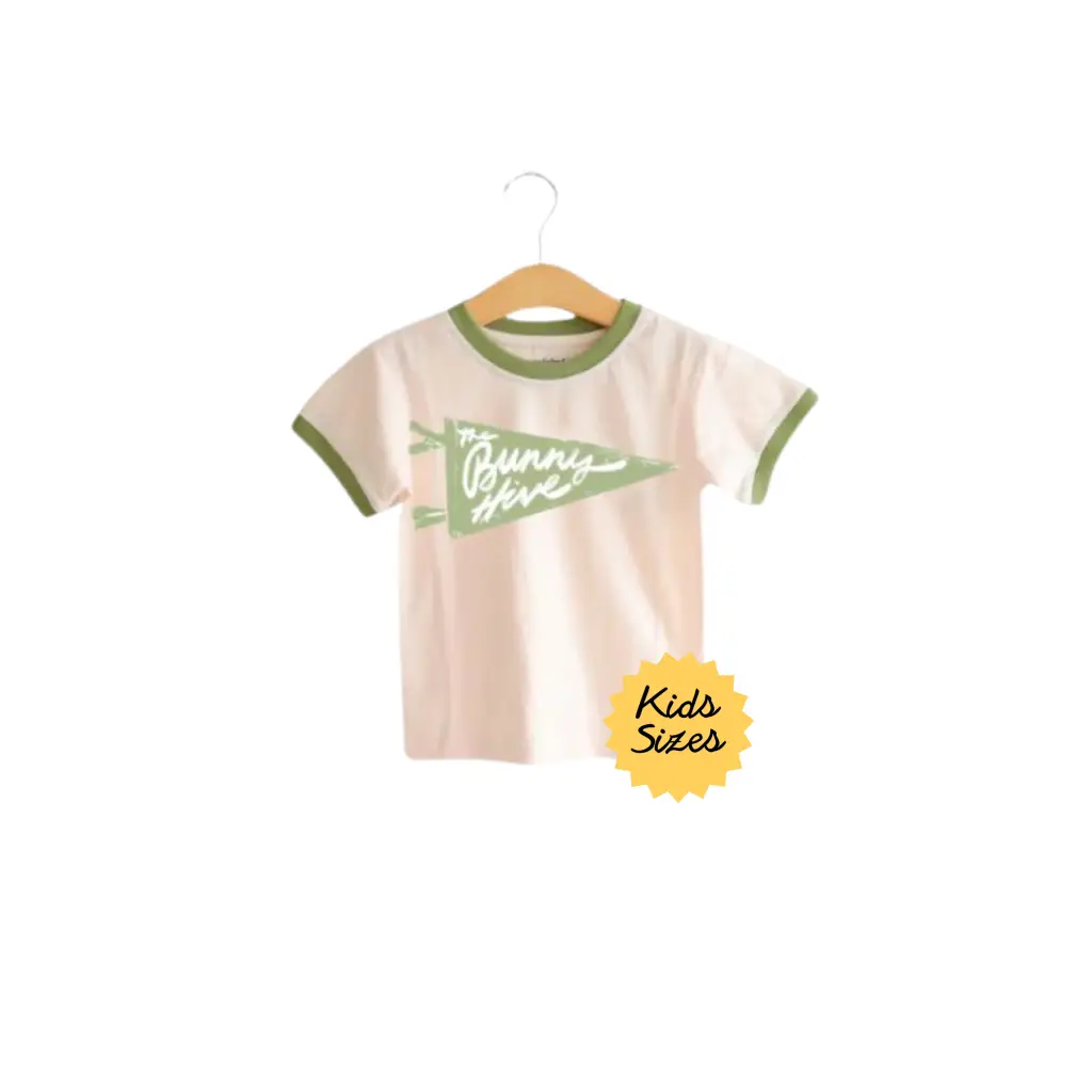 Kids t-shirt on hanger featuring Bunny Hive Signature Ringer Tee in vibrant green