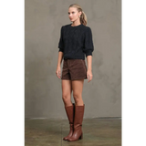 Stylish knit sweater with brown leather knee-high boots