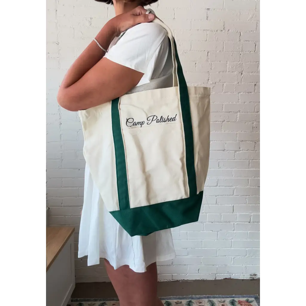 Cream canvas boat tote with forest green base and straps from Camp Polished