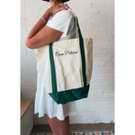 Cream canvas boat tote with forest green base and straps from Camp Polished