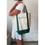Cream canvas boat tote with forest green base and straps from Camp Polished
