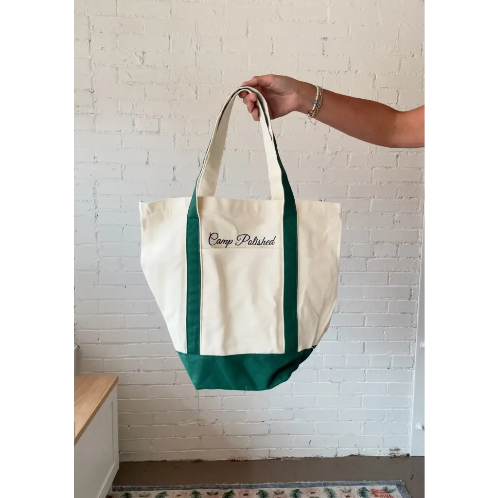 Cream canvas boat tote with forest green base and straps from Camp Polished