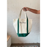 Cream canvas boat tote with forest green base and straps from Camp Polished