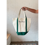 Cream canvas boat tote with forest green base and straps from Camp Polished