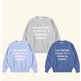 Three unisex pullover sweatshirts in gray, blue with bold text: Can someone put a woman in charge?