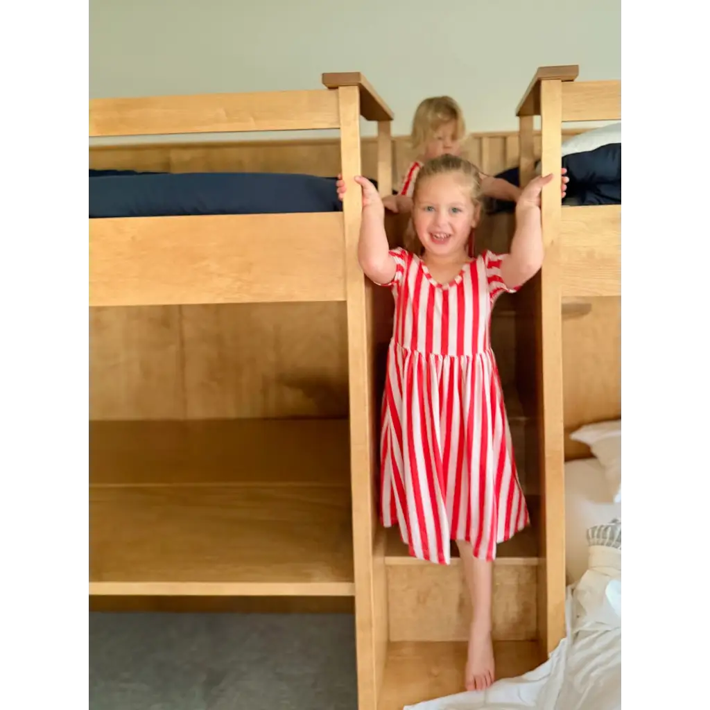 Red and white striped bunk bed frame for Candy Cane Lane bamboo twirl dress