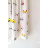 White fabric with colorful cat faces on Cat Lover Bamboo Twirl Dress