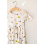 Cute Cat Lover Bamboo Twirl Dress featuring adorable cat faces on a white background