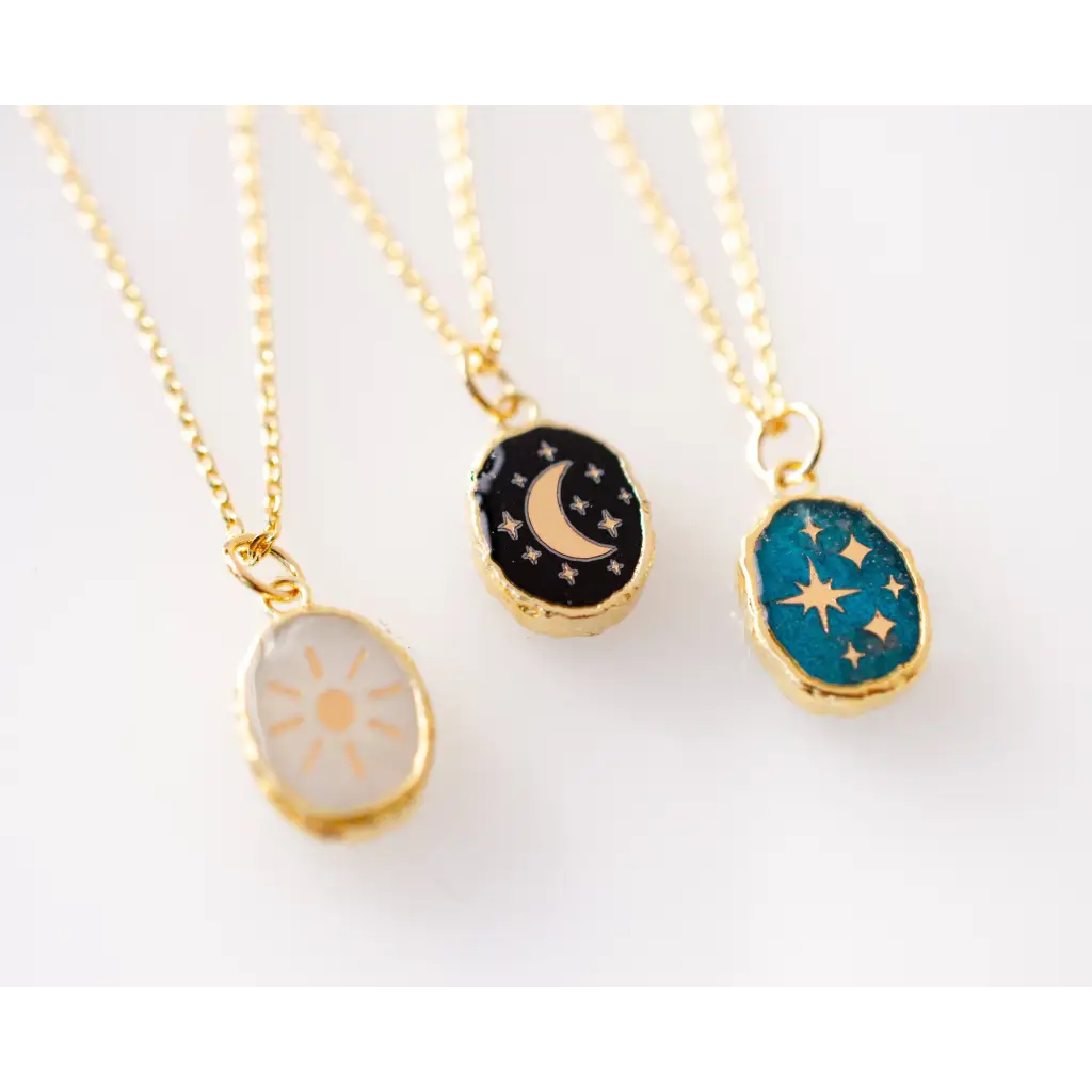Gold plated celestial pendants with sun, moon, stars in stylish womens designs