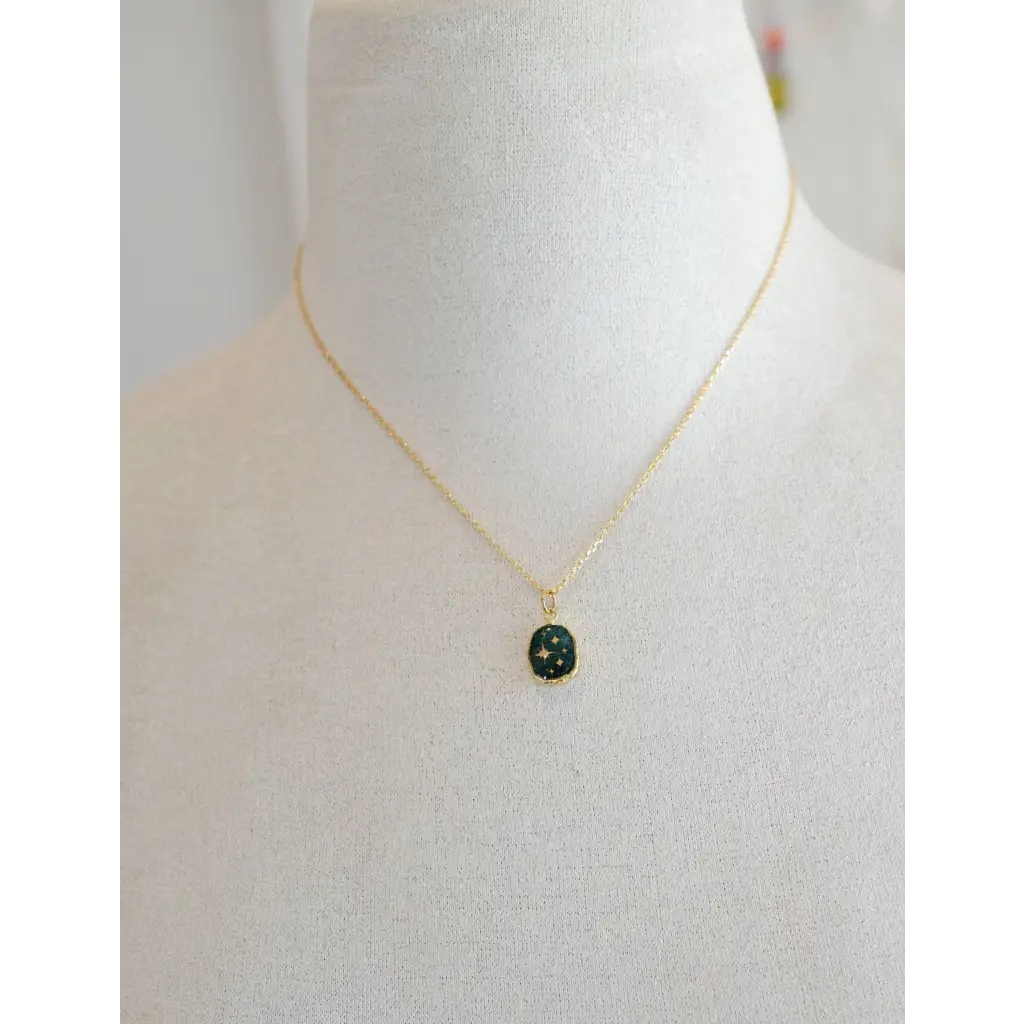 Delicate gold plated Celestial Gemstone Pendant Necklace with green enamel stars