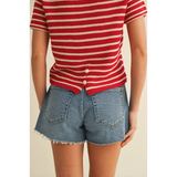 Red and white striped short sleeve sweater top paired with light-wash denim shorts