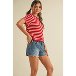 Woman in Channel Short Sleeve Striped Sweater Top with red and white stripes and denim shorts