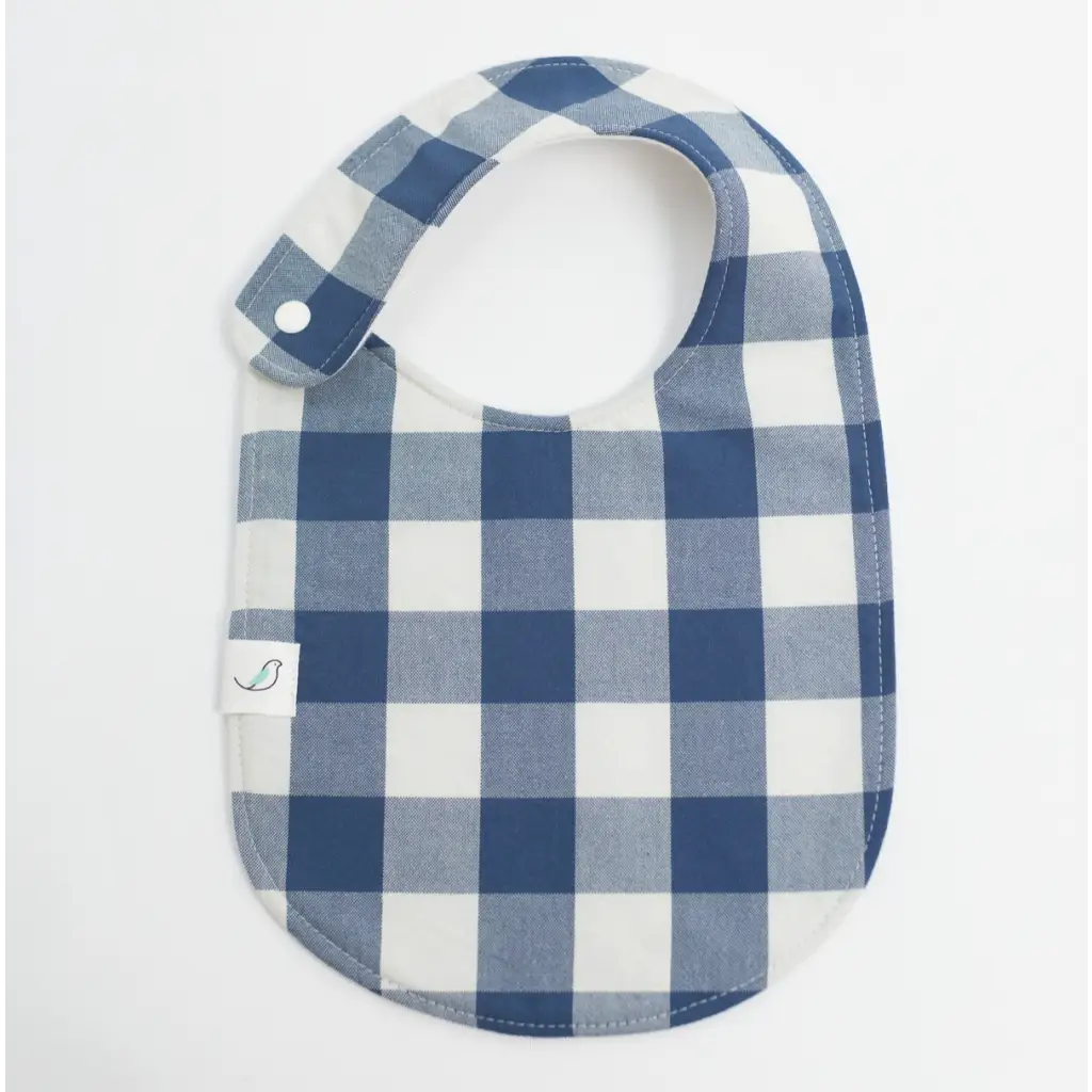 Blue and white gingham Charlie Snap Bibs with snap closure for stylish baby feeding