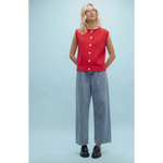 Woman in red top and wide-leg jeans wearing Cherry Red Sweater Button-Up Vest for stylish womens clothes