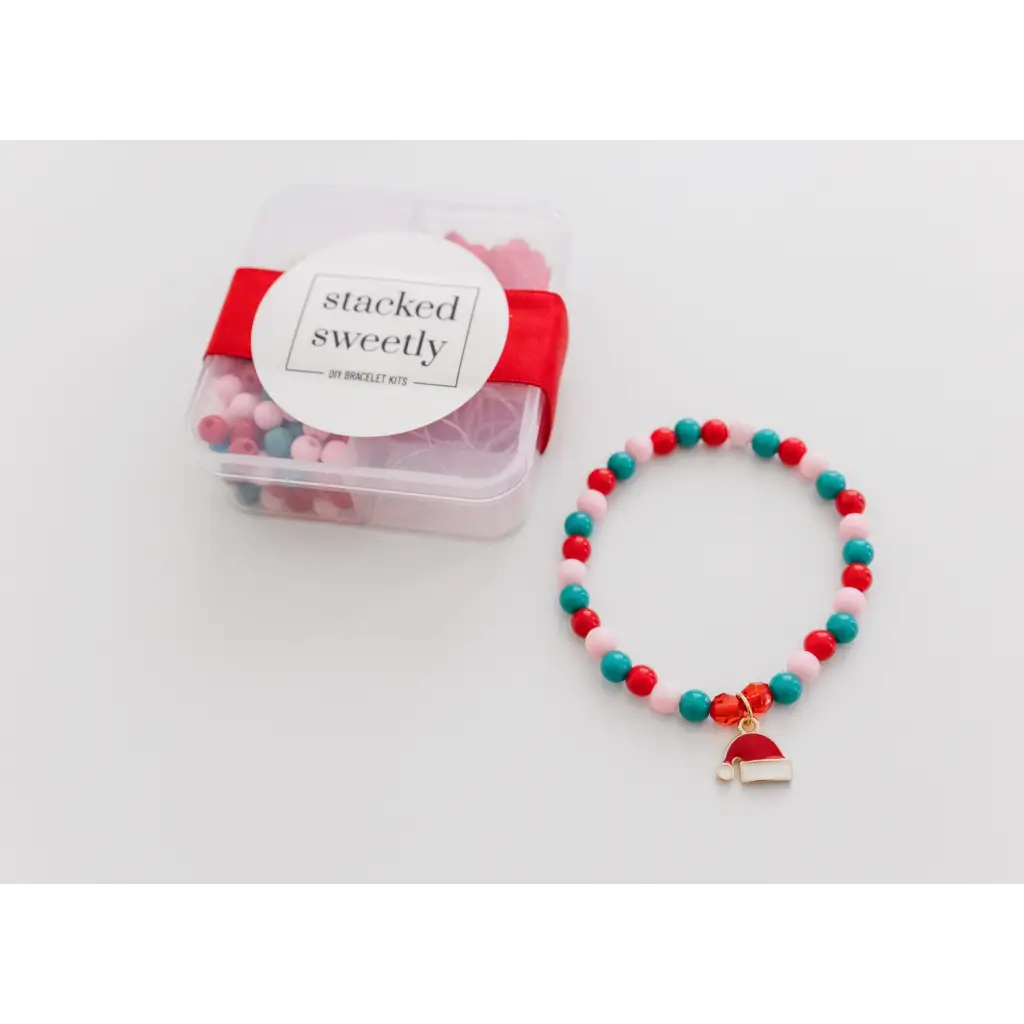 Beaded bracelet with red and turquoise beads and cake charm for a perfect Christmas stocking