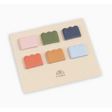 Colorful scalloped sticky notes on a board for Cloud Sticky Index Tabs highlighting Cloud Sticky