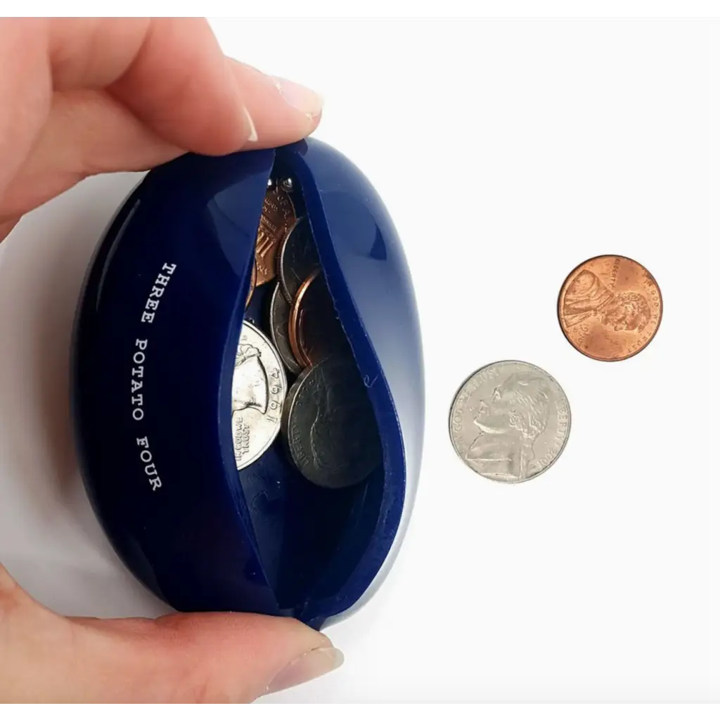 Blue Coin Pouch for Sourdough Money with shiny coins, perfect for stylish womens clothes