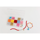Colorful bead organizer box with finished stretchy bracelet and necklace from Color My World Bracelet Craft Kit